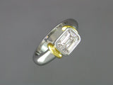 EMERALD CUT DIAMOND RING WITH SHOULDERS