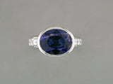 ROUND DIAMOND & BLUE SAPPHIRE RING