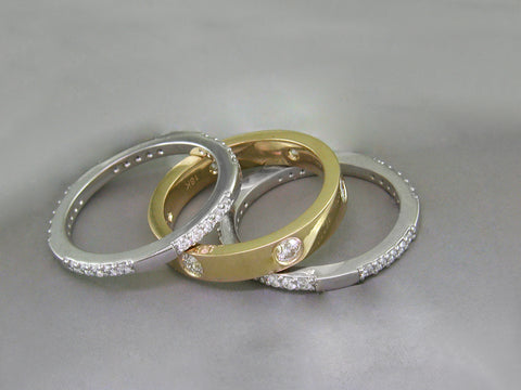 YELLOW GOLD RING WITH BURNISH SET DIAMONDS & DIAMOND ETERNITY RINGS