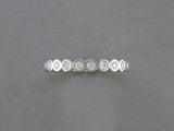 BEZEL SET ROUND DIAMOND ETERNITY RING