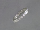 BEZEL SET ROUND DIAMOND ETERNITY RING
