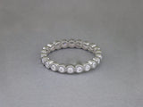 BEZEL SET ROUND DIAMOND ETERNITY RING