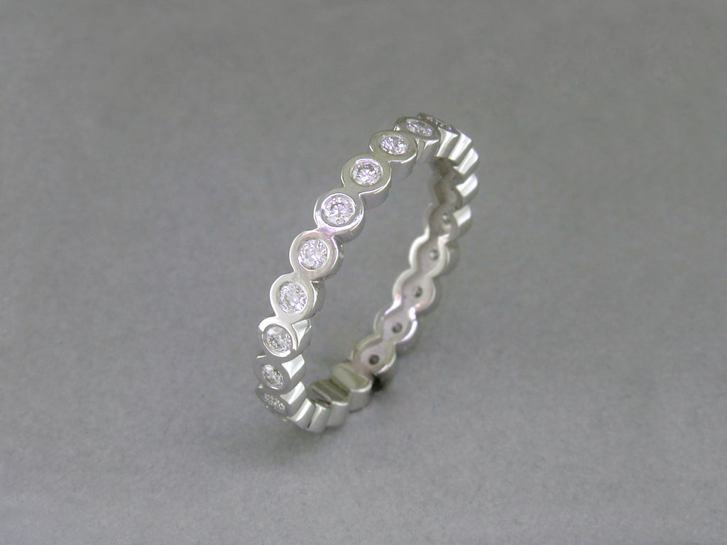 BEZEL SET ROUND DIAMOND ETERNITY RING