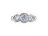 ROUND & PEAR SHAPE DIAMOND RING