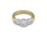 ROUND & PEAR SHAPE DIAMOND RING