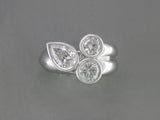PEAR SHAPE & ROUND DIAMOND RING