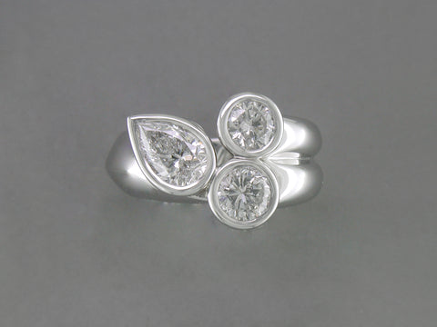 PEAR SHAPE & ROUND DIAMOND RING