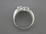 PEAR SHAPE & ROUND DIAMOND RING
