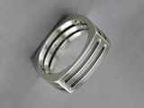 WHITE GOLD WEDDING BAND WITH SQUARE SHANK AND OPEN SLOT ELEMENT