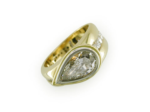 PEAR SHAPE & CHANNEL SET DIAMOND RING