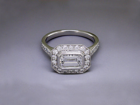 EMERALD CUT DIAMOND RING WITH PAVE BAND