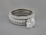 ROUND DIAMOND RING WITH PAVE BAND