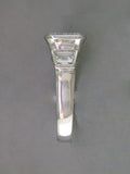 EMERALD CUT & TRAPEZOID DIAMOND RING