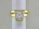 EMERALD CUT DIAMOND RING IN YELLOW GOLD