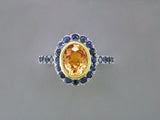 YELLOW SAPPHIRE RING WITH BLUE SAPPHIRE PAVE